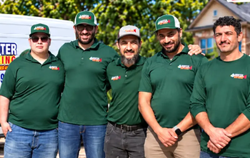 AL Rooter Plumbing owner with four of his technicians